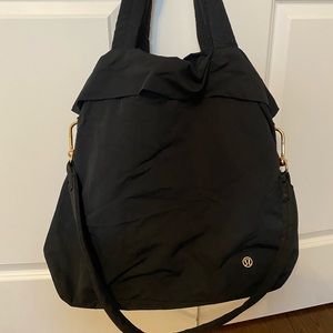 LULULEMON- on my level bag. Black with gold hardware. 30L.